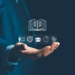 A stylised image of a hand holding images representing learning, goals, and sales