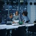 A corporate group discussing situational leadership